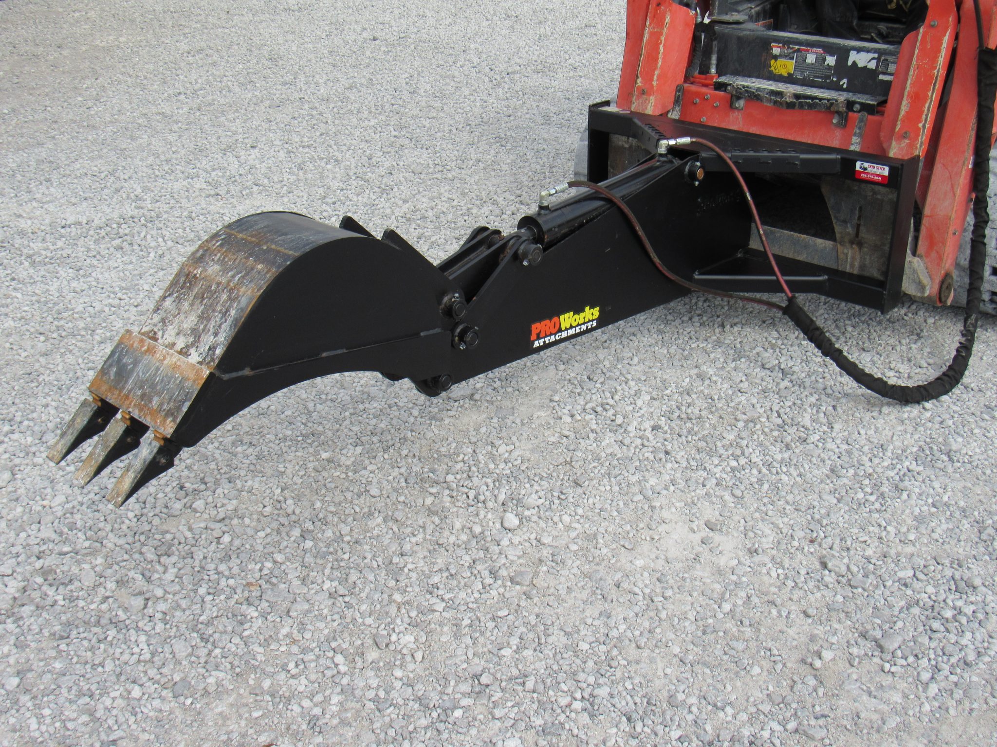 Stiff Arm Backhoe Attachment with 12″ Tooth Trench Bucket Fits Skid