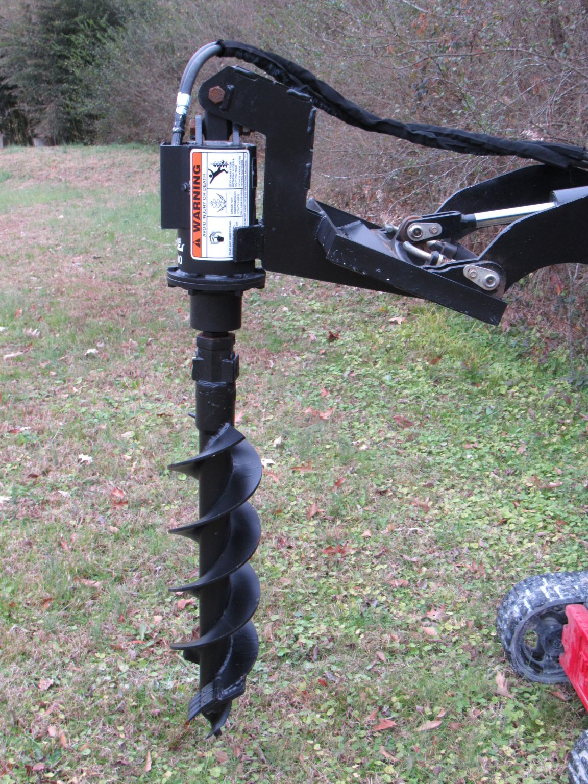 Lowe TJ100 Hex Auger Drive with 12″ Bit Fits Mini Skid Steer Skid